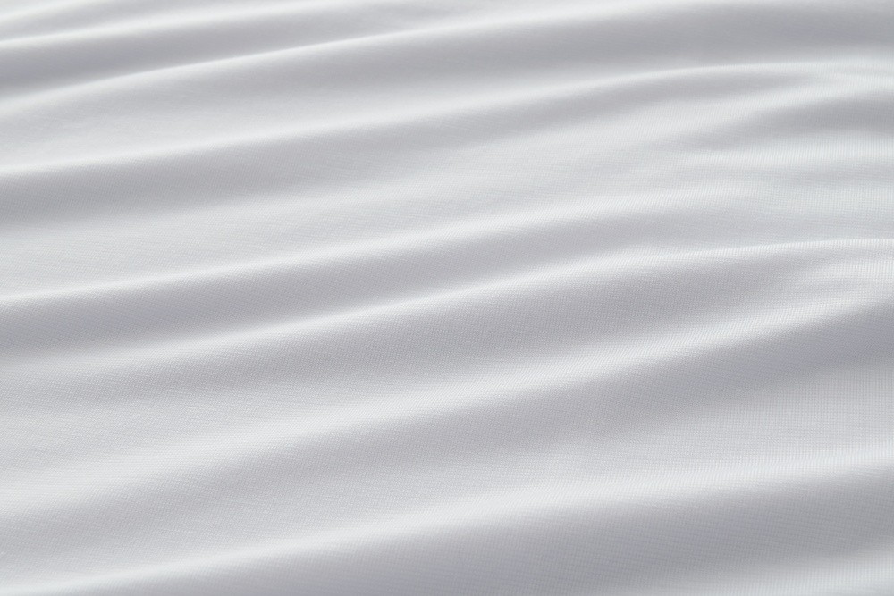 Tempur-Pedic Breeze Cooling closeup of white sheet