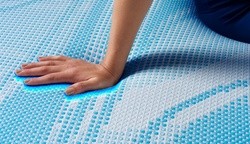 Hand showing cooling effect on Breeze mattress