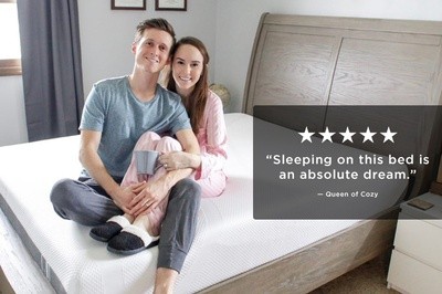 Photo of couple on bed with 5 star review