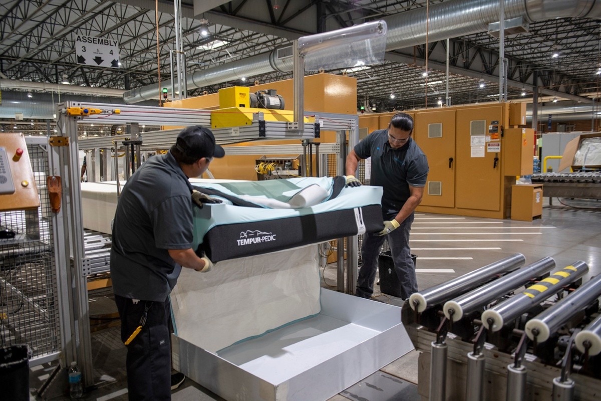 Employees constructing a Tempur-Pedic mattress in our Albuquerque manufacturing plant