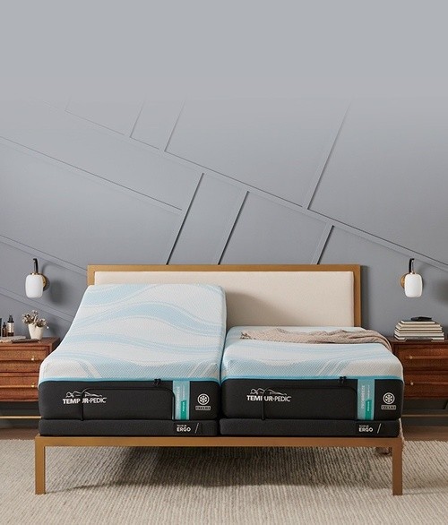 A split king mattress in a decorated room