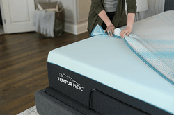 Woman Removing Breeze Mattress Cover