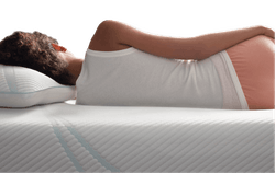 Profile of Woman Lying on Her Body-Adapting Tempur-Pedic